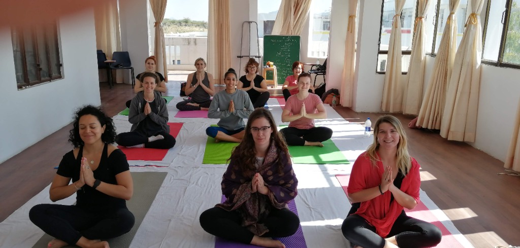 Raja Yoga classroom prayer pose